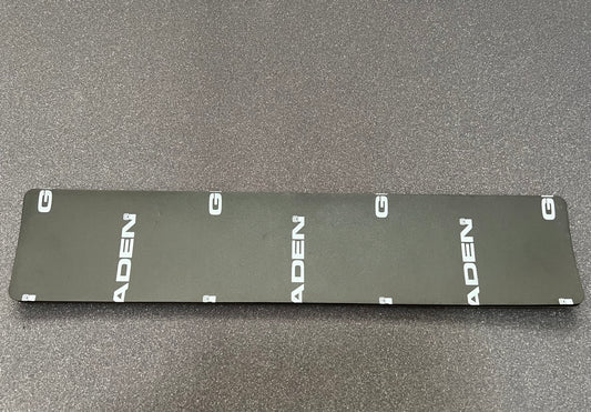 Damping piece - license plate holder